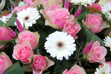 Pink roses, white gerberas in bridal arrangement