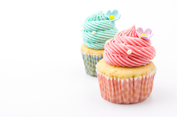 Vanilla cupcakes isolated white background