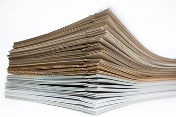 Stack of brown and white paper
