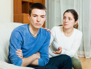 Man has problem, wife comforting him