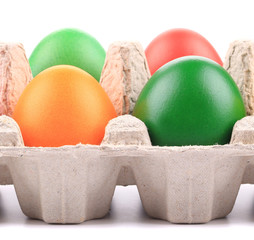 Colorful Easter Eggs in box.