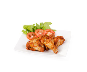 Chicken sticks on plate with sidedish vegetable isolated