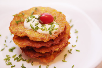 Potato pancakes with tomato