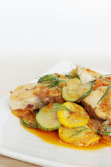 Baked fish with zucchini