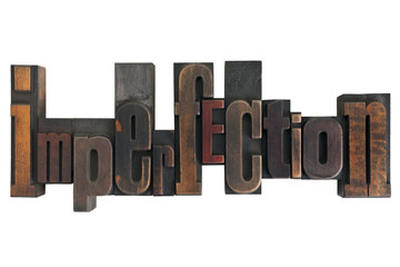 imperfection, word written in vintage printing blocks
