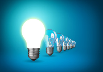 Idea concept with light bulbs on blue