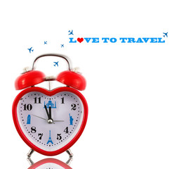 Love to travel! Heart clock with landmarks isolated