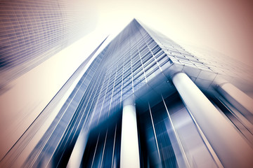 Fototapeta na wymiar abstract texture of blue glass modern building skyscrapers