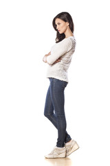 serious girl posing with crossed arms