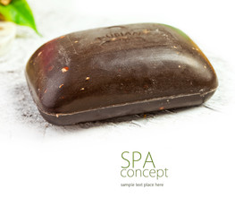 african black soap on white wood