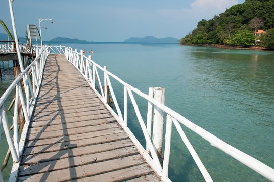 White wooden bridge at the sea © peangdao