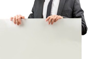 Businessman holding a blank sign