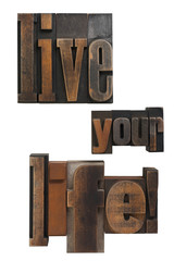 live your life phrase written in vintage printing blocks