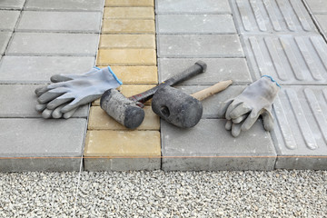 Mason tools for brick pavement installing rubber hammer, gloves
