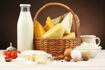 Fotobehang Zuivelproducten Basket with tasty dairy products