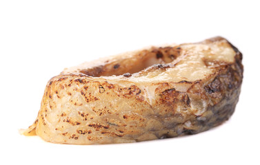 Grilled carp steak close up.