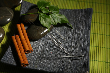 Composition with needles for acupuncture, close up.
