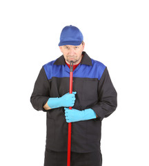 Man in workwear with mop