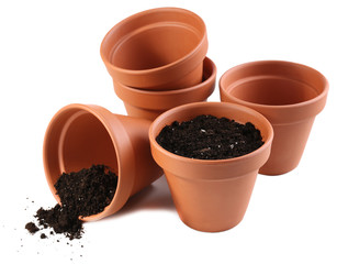 Clay flower pots and soil, isolated on white