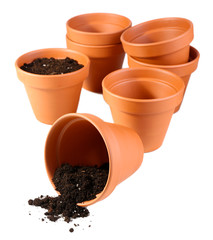 Clay flower pots and soil, isolated on white