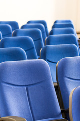 Fototapeta premium Blue Chairs Close Up In Conference Room