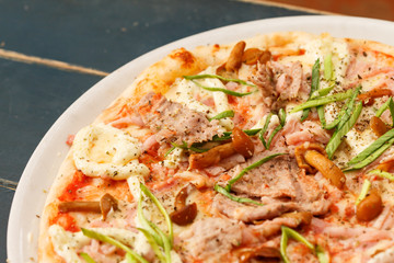 pizza with beef and mushrooms