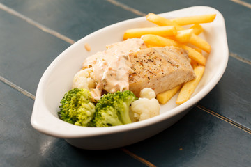 chicken breast with french fries