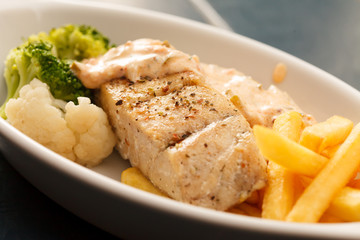 chicken breast with french fries