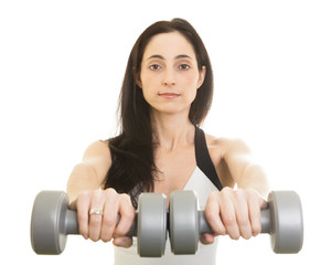 woman working out with dumbbells. Isolated