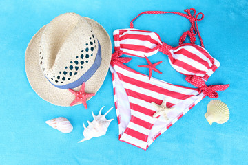Obraz premium Swimsuit on color background