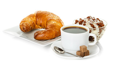 cup of coffee, fresh croissants and muesli