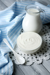 Dairy products on wooden table background