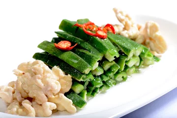Wandcirkels aluminium Chinese Food: Salad made of walnut kernel and vegetable © bbbar