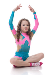 Image of cute little girl doing gymnastics
