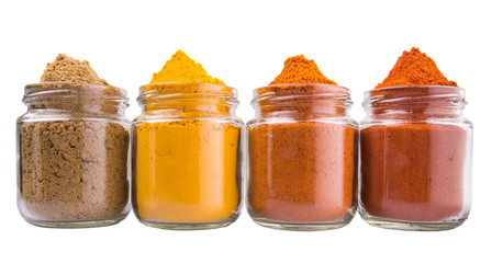 Various spices over white background