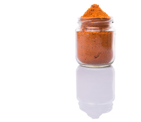 Curry powder spices over white background