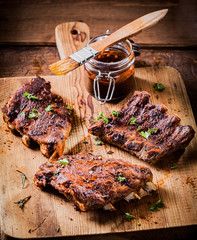 Three portions of spicy grilled ribs