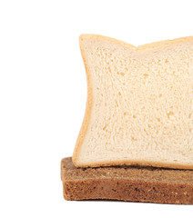Piece of white and black bread.
