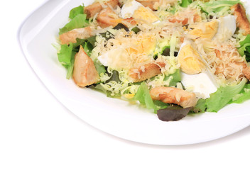 Caesar salad dish close up.
