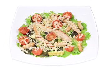 Caesar salad dish close up.