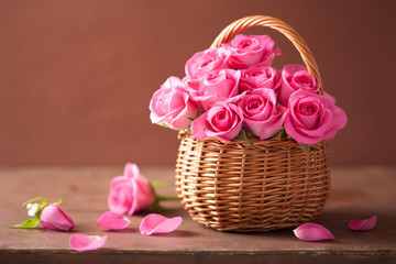 beautiful pink roses in basket