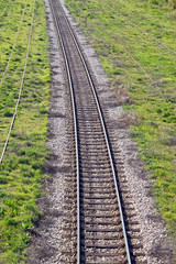 Fototapeta na wymiar Railroad track through the landscape