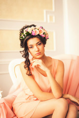 Beautiful woman with flowers on her head