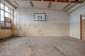Abandoned sports hall in a devastated building