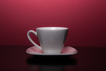 cup of coffee with red background