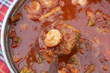 hot and sour curry with tamarind sauce, shrimp and vegetables