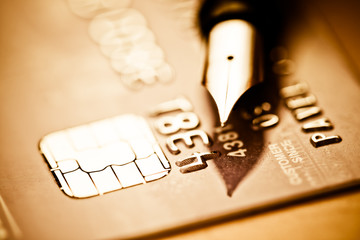 Credit card and pen