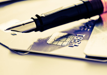 Credit card and pen