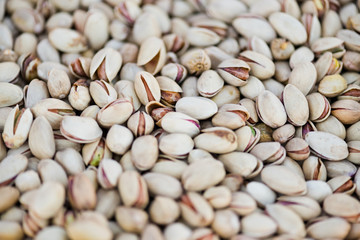 Close up view on pistachios (into nutshells)