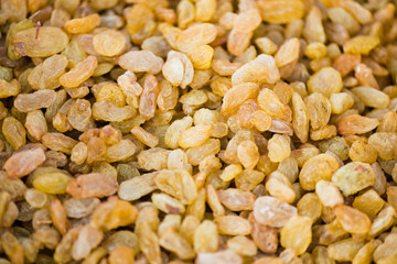 Golden raisins close-up background